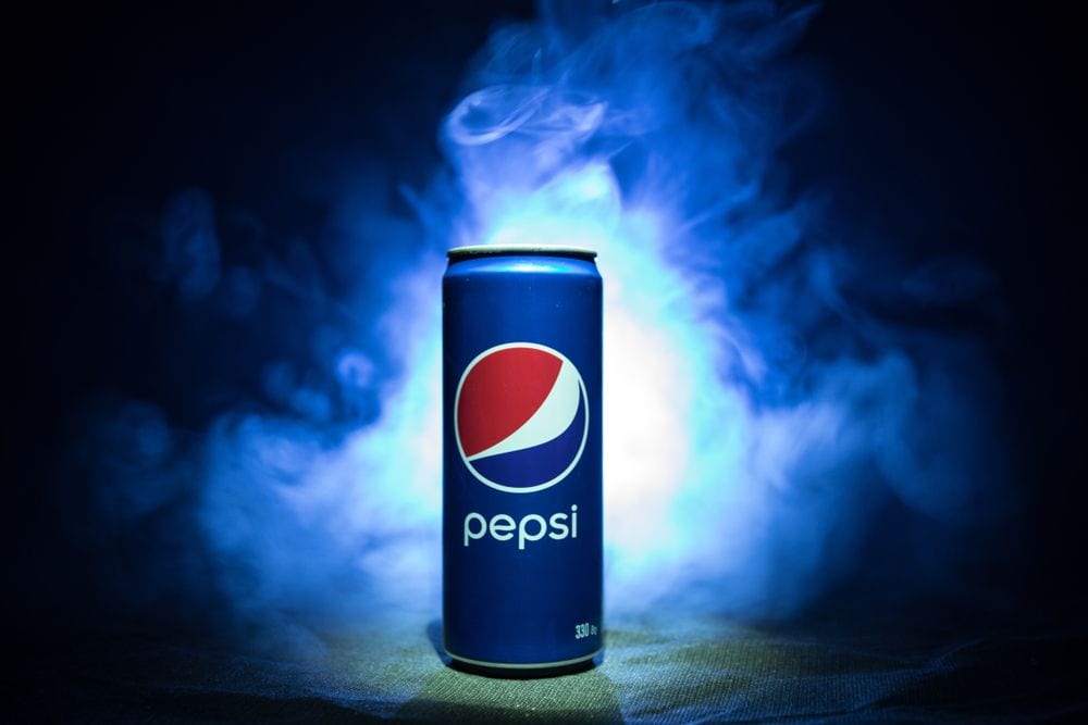 Sales of blue cans of Pepsi like the one pictured here help increase PepsiCo's dividend each year | Investment U