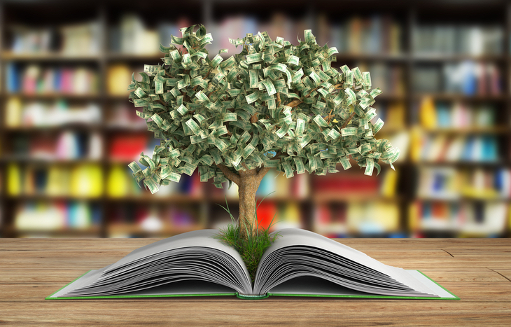 Money Tree Growing Out of Stock Market Book