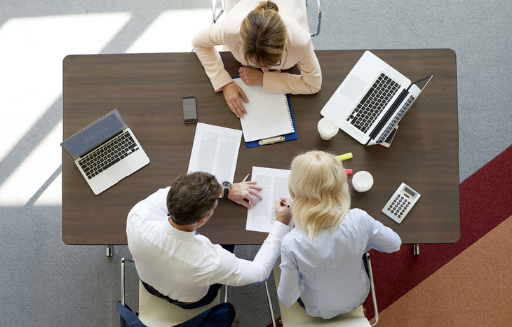 Overlooking a team finding the best investing blogs.