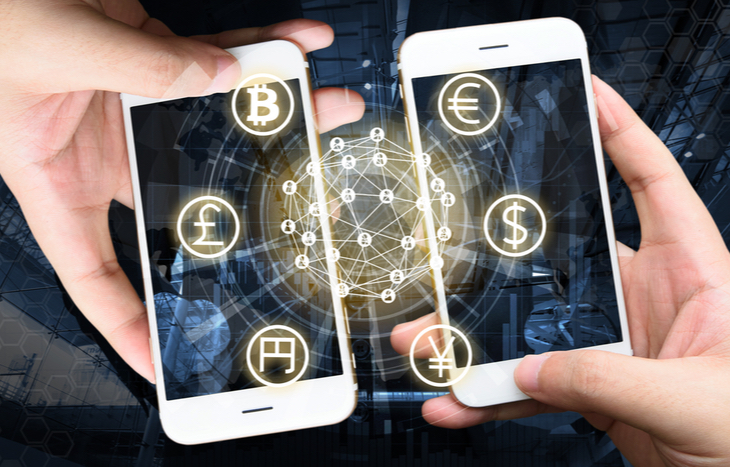 two smartphones finding the top fintech ETFs